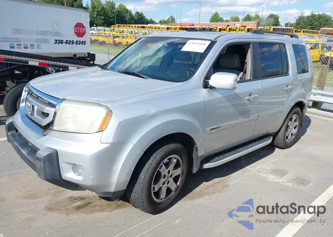 2009 Honda Pilot Touring z USA, uszkodzony, nr VIN 5FNYF38999B006190